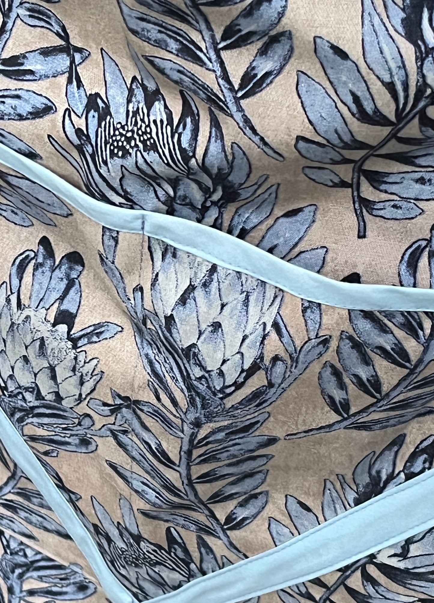 100% Cotton Apron, Beige with Light Blue Protea motif, fully lined